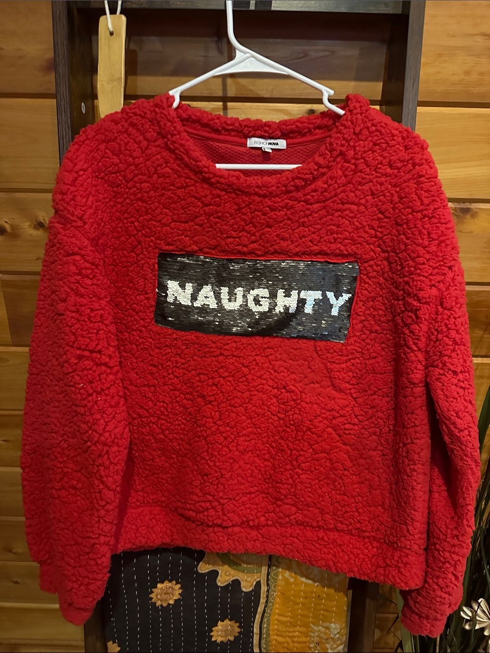 Fashion Nova Red faux sherpa Sweatshirt with 'NAUGHTY' and “NICE” Sequin Patch